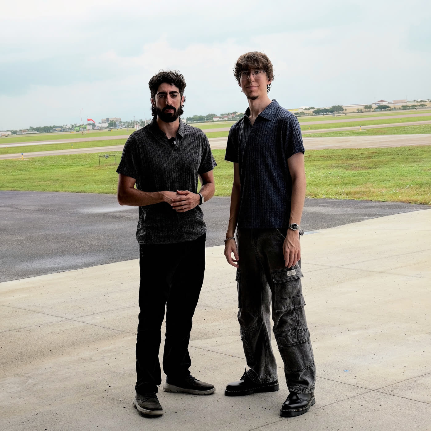 Cristian and Isaac, the founders of Stratus Marketing, on the airport ramp